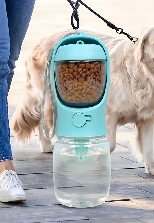Two-in-one pet kettle with water storage and grain storage compartments, used with a dog outdoors.